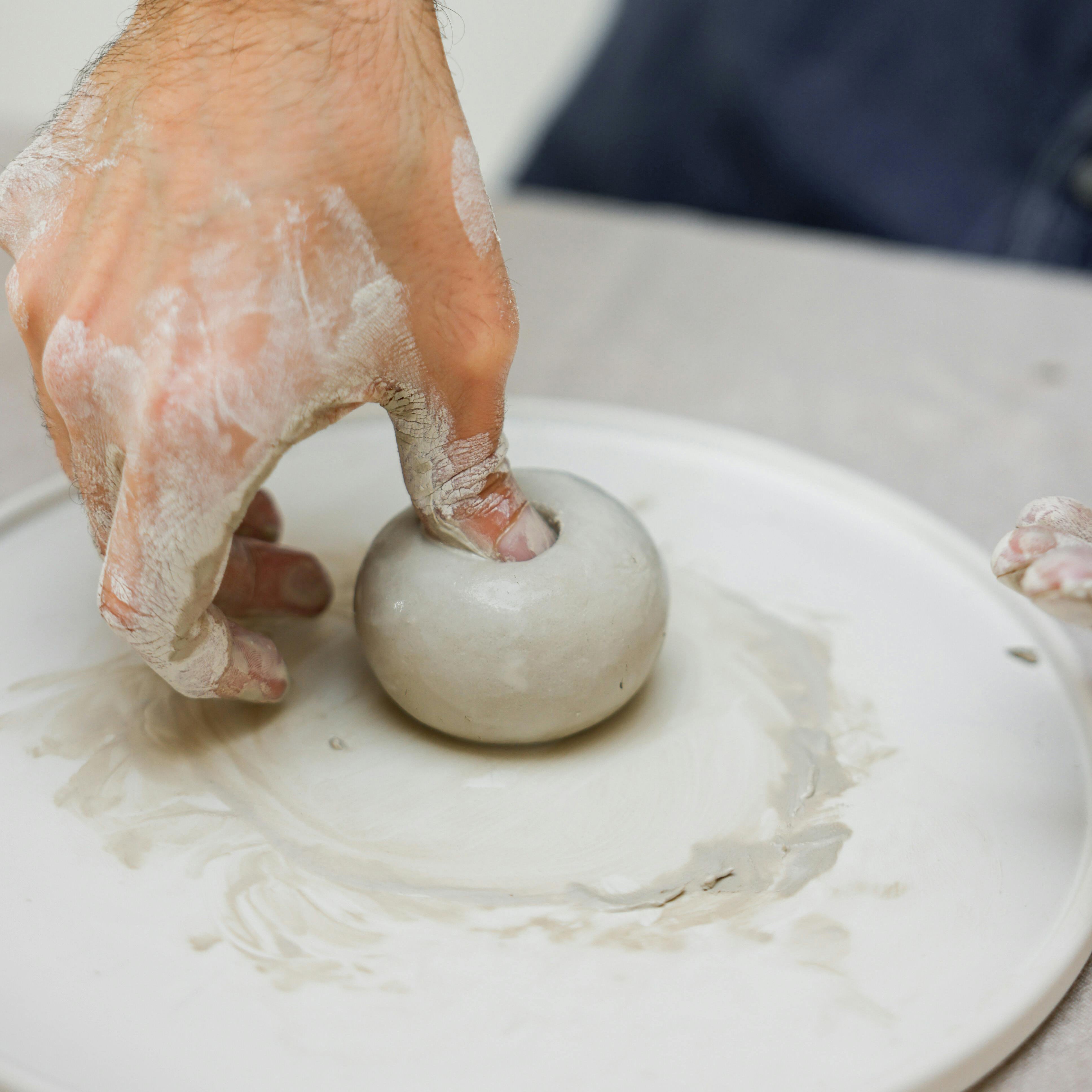 Ceramicist making handmade objects