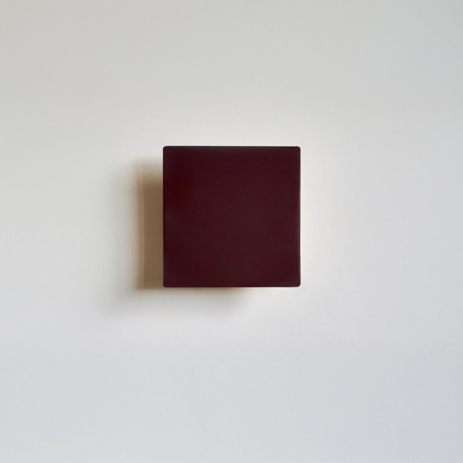 Ceramic wall light creating a soft ambient glow