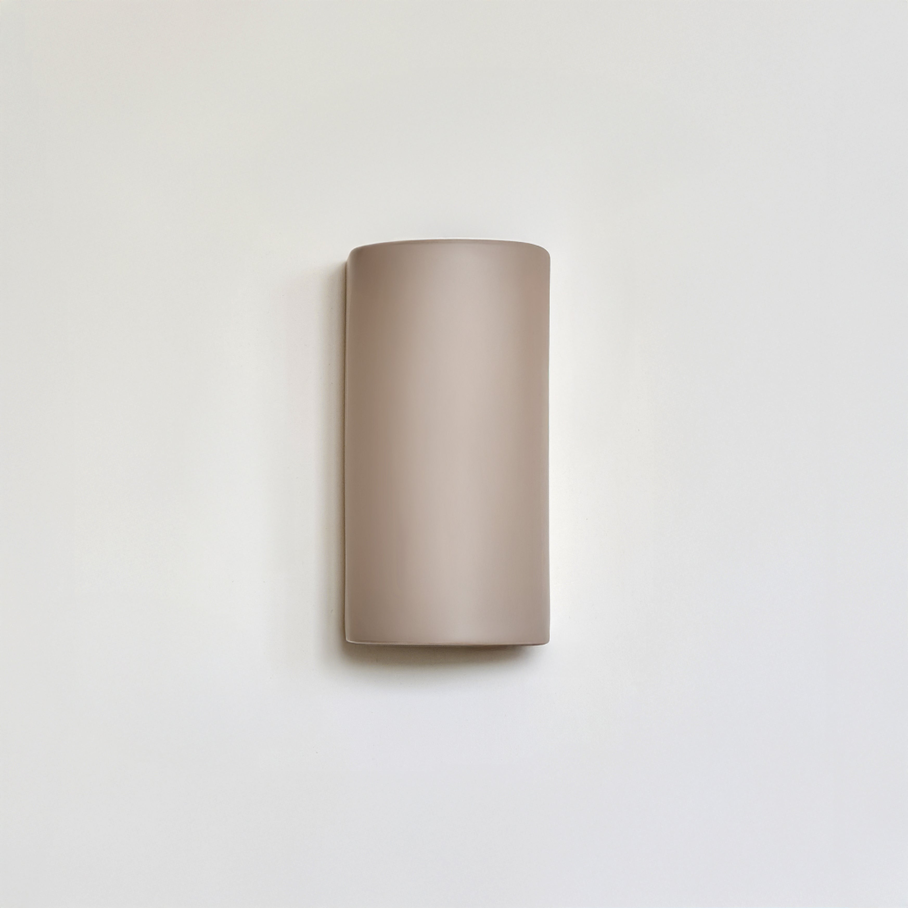 Sculptural wall lamp in ceramic