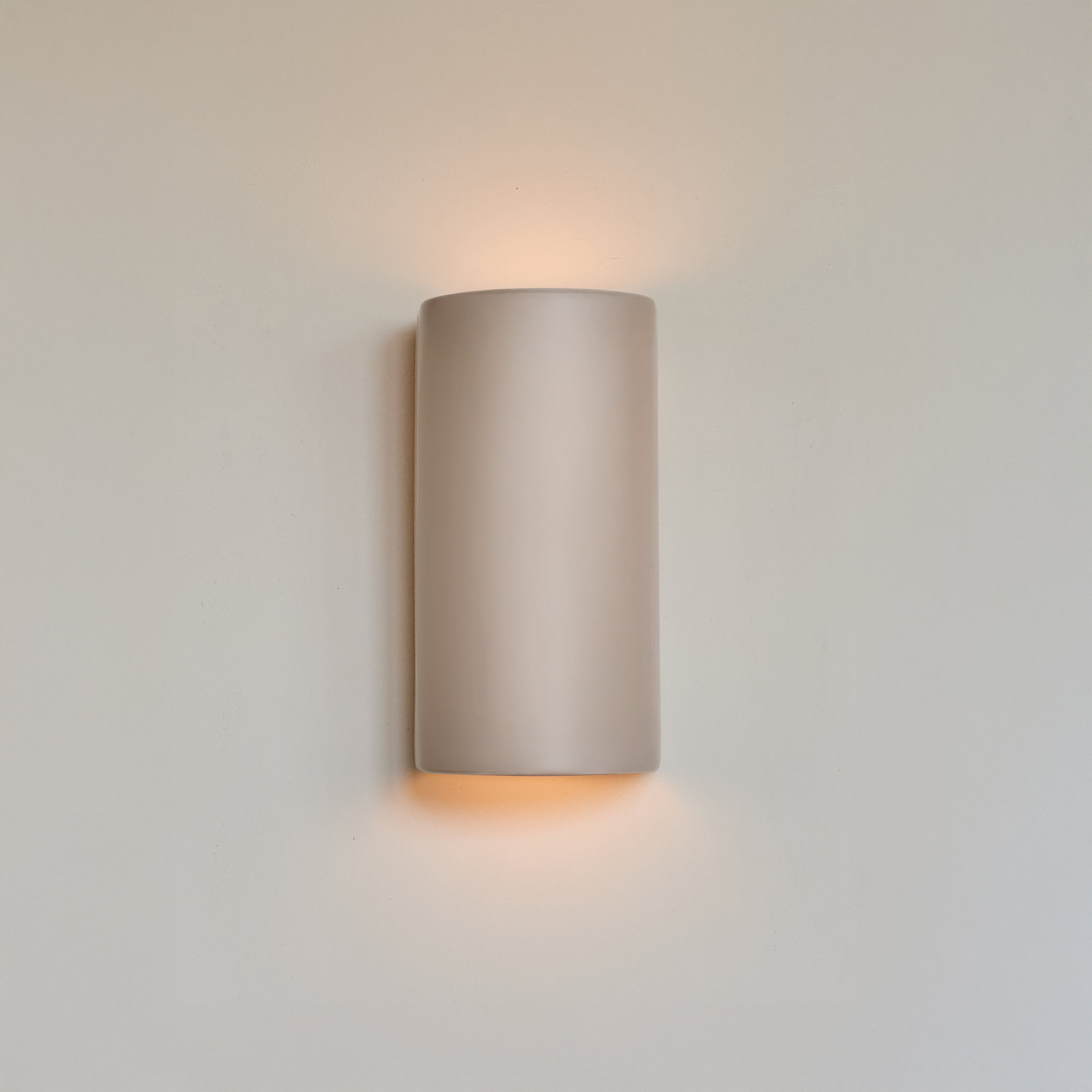 Sculptural wall lamp in ceramic